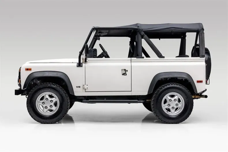 Lateral Land Rover Defender 90 1997 Blanco