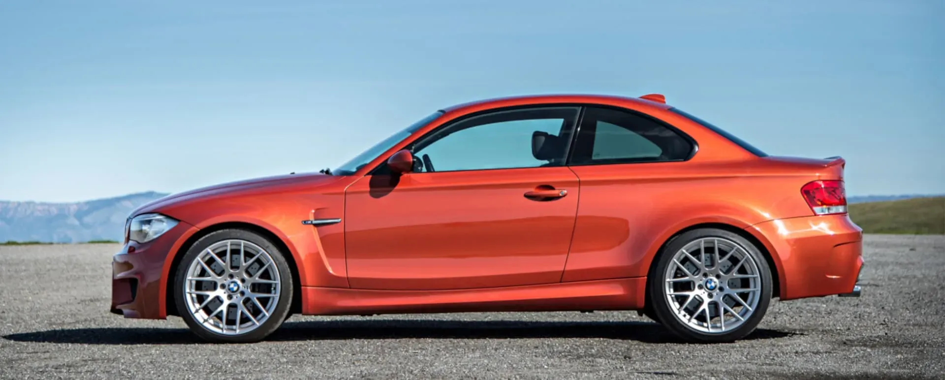 Lateral BMW 1M Coupé 2011 Naranja