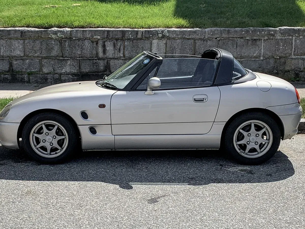 Lateral Suzuki Cappuccino 1991 Plateado