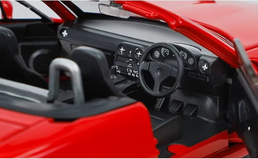 Interior a detalle en auto a escala 1:32 convertible color rojo