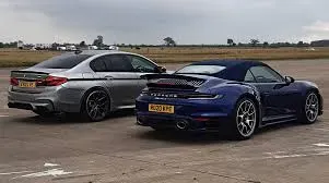 Porsche 911 Turbo S vs BMW M5 CS