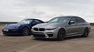 Porsche 911 Turbo S vs BMW M5 CS