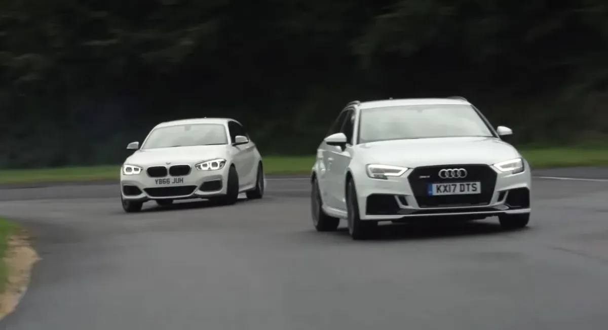 Audi RS3 vs. BMW M140i: ¡Una Batalla de Hatchbacks! 🏎️🔥