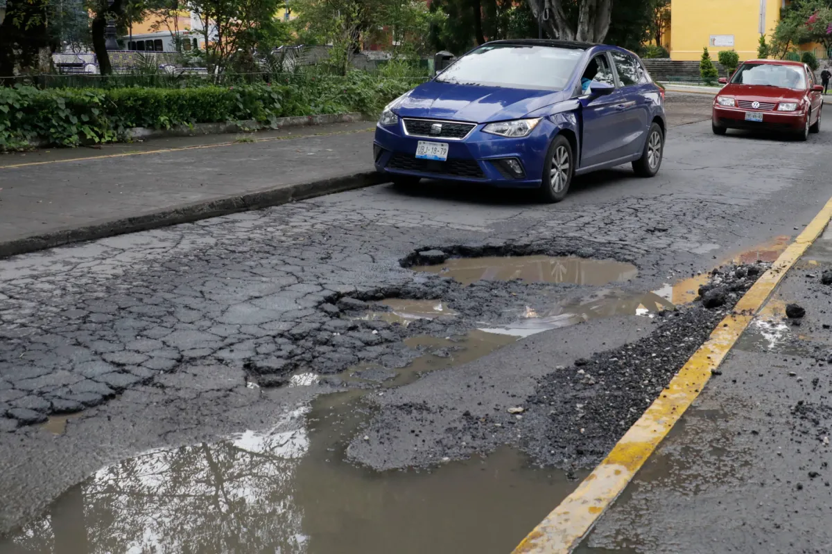 Cómo Reportar un Bache en Tu Ciudad: Aplicaciones y Teléfonos 🚗🤬