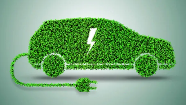 Silueta de auto eléctrico con césped